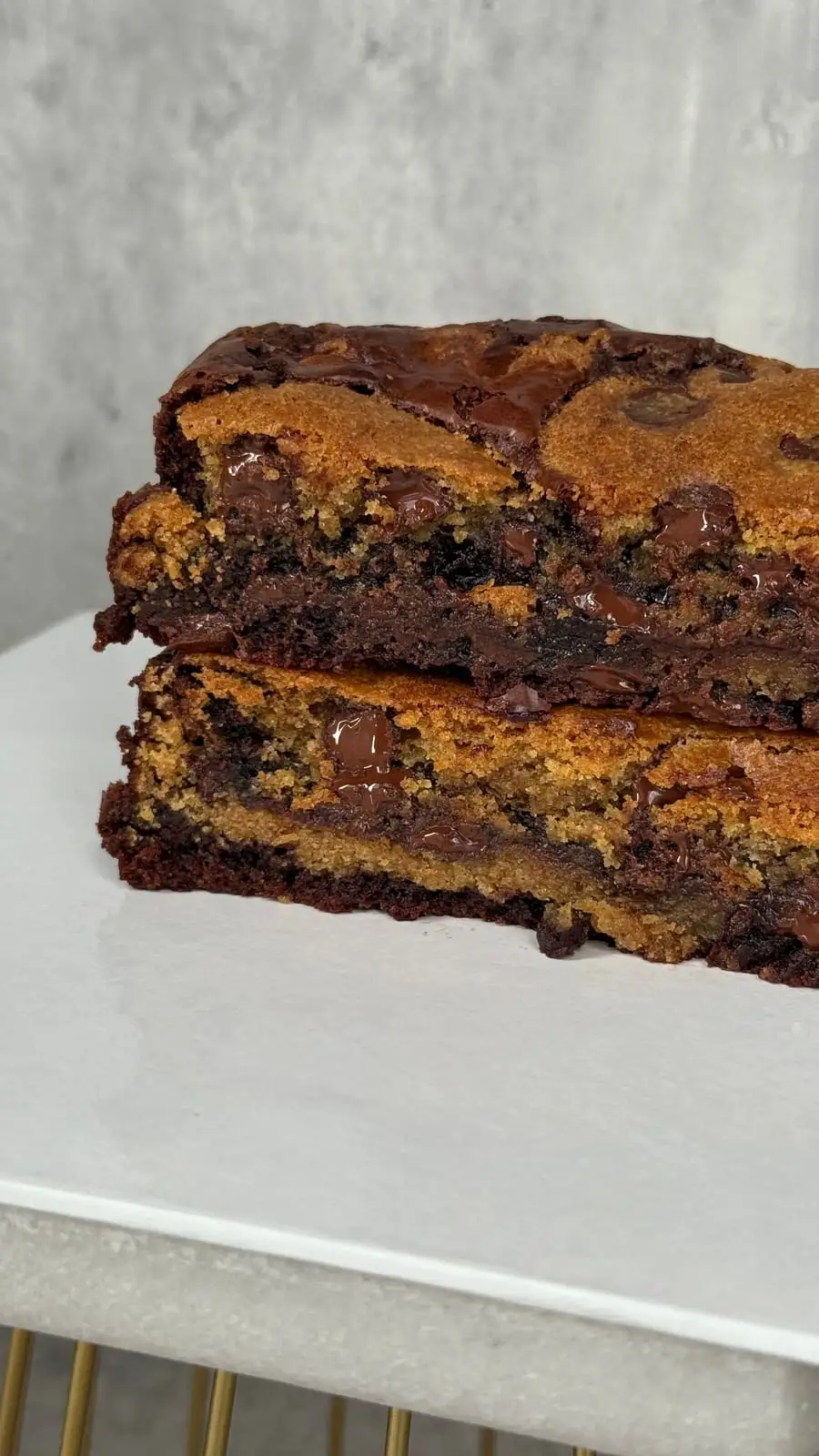 Chocolate chip cookie cake with a crisp golden top, chocolate chunks, and a fudgy centre.